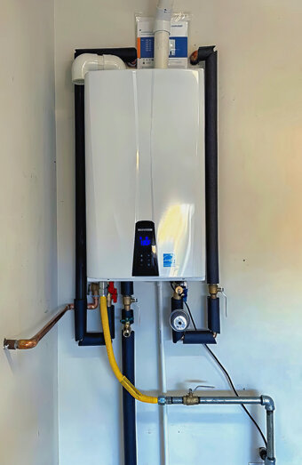 https://wangarahotwater.com.au/uploads/2025/06/instant-hot-water-systems-63860.jpg